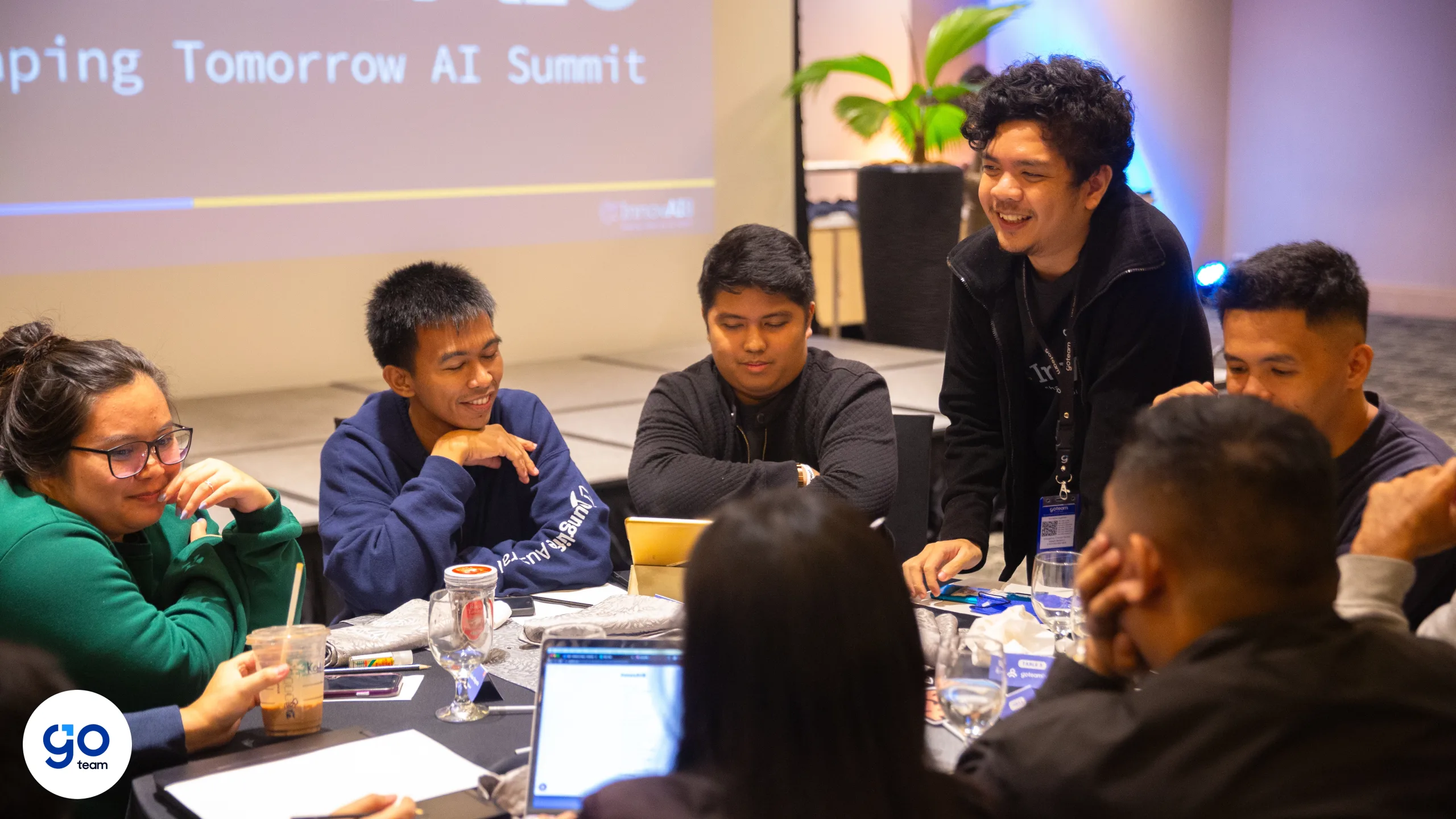 AI Summit Day 1 - Go Team Developers brainstorming